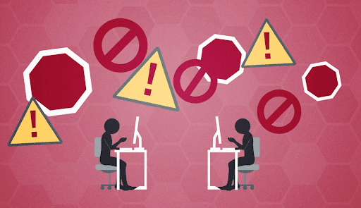 Two people sitting at their desks with hazard signs and exclamation points floating around them